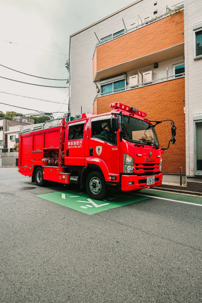 A red fire truck parked on a street.